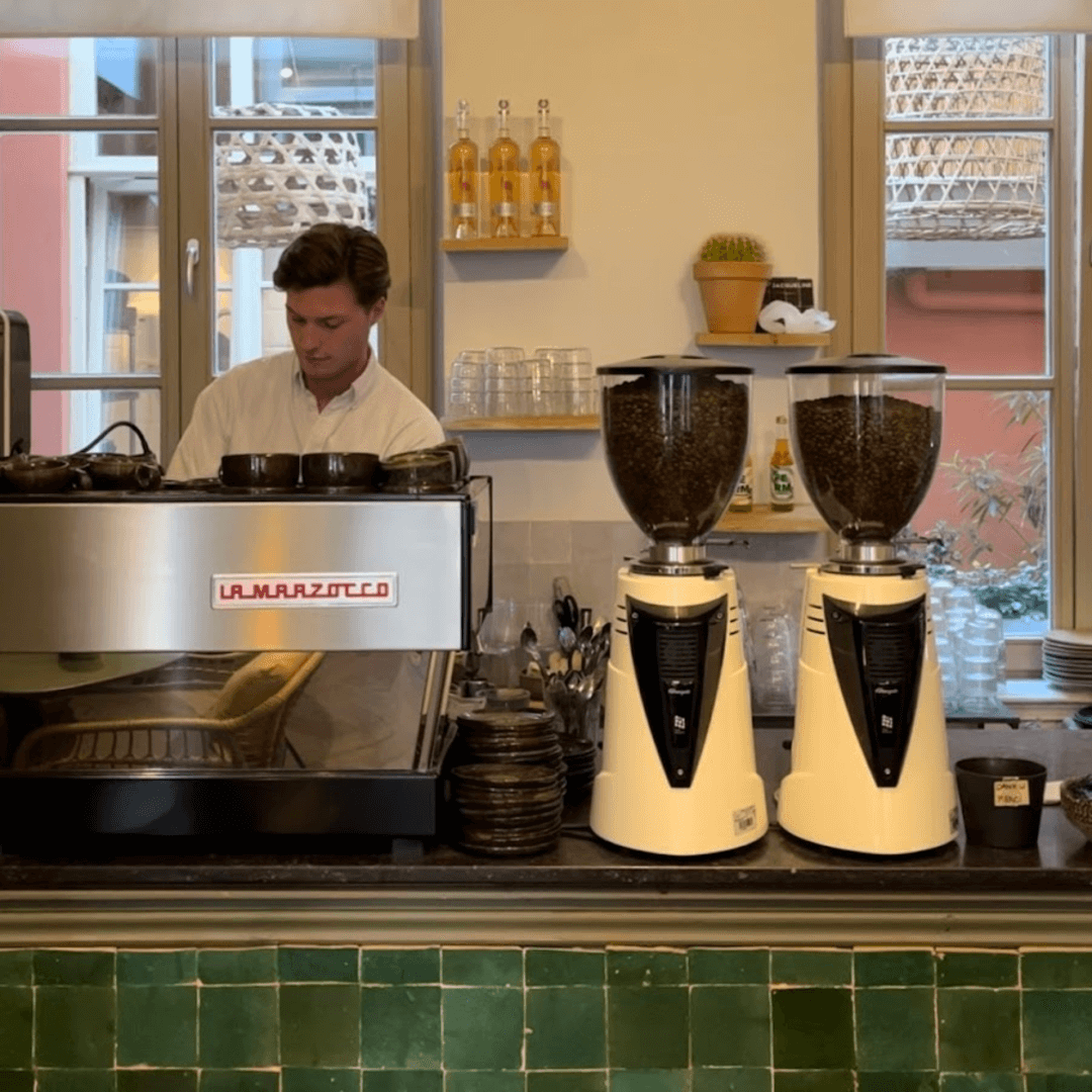 the barman preparing the coffee