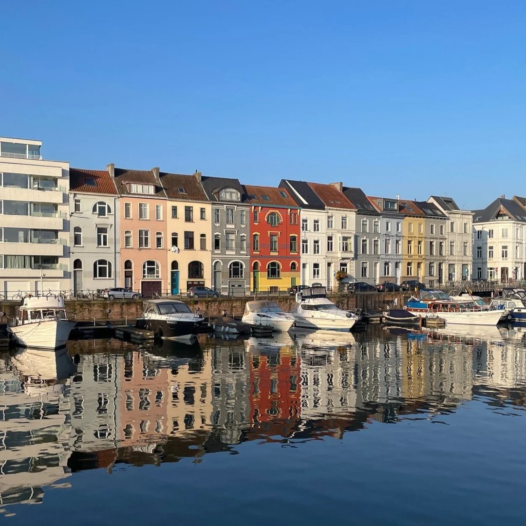 Portus Ganda marina with colorful historic houses and boats in Ghent, Belgium