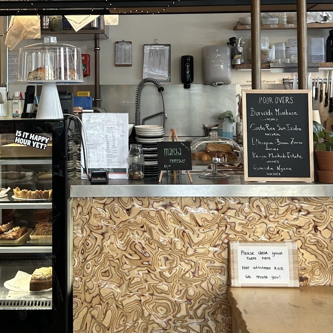 counter of Ana attento coffee bar showing a selection of pastries 