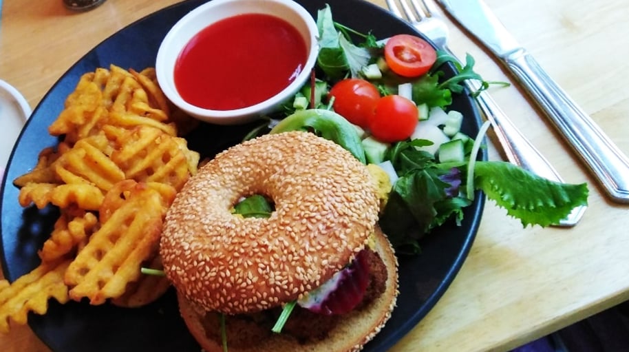 vegetarian bagel burger and fries