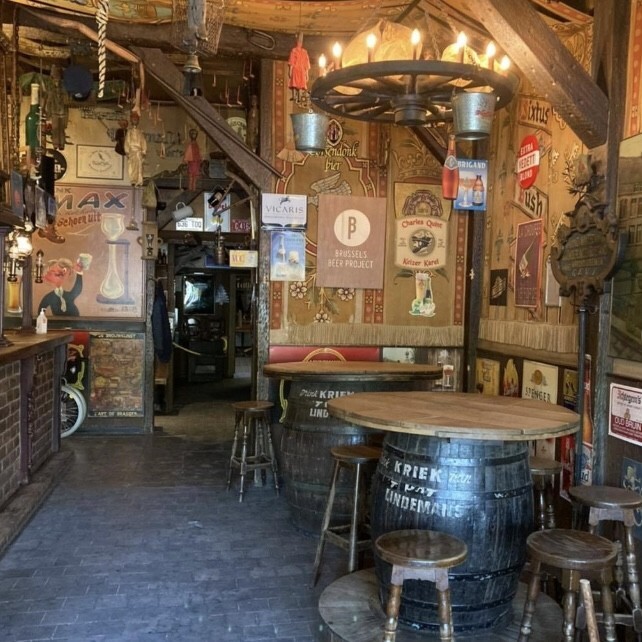 A very cozy pub with many beers on tap, vintage decoration and buckets for the shoe