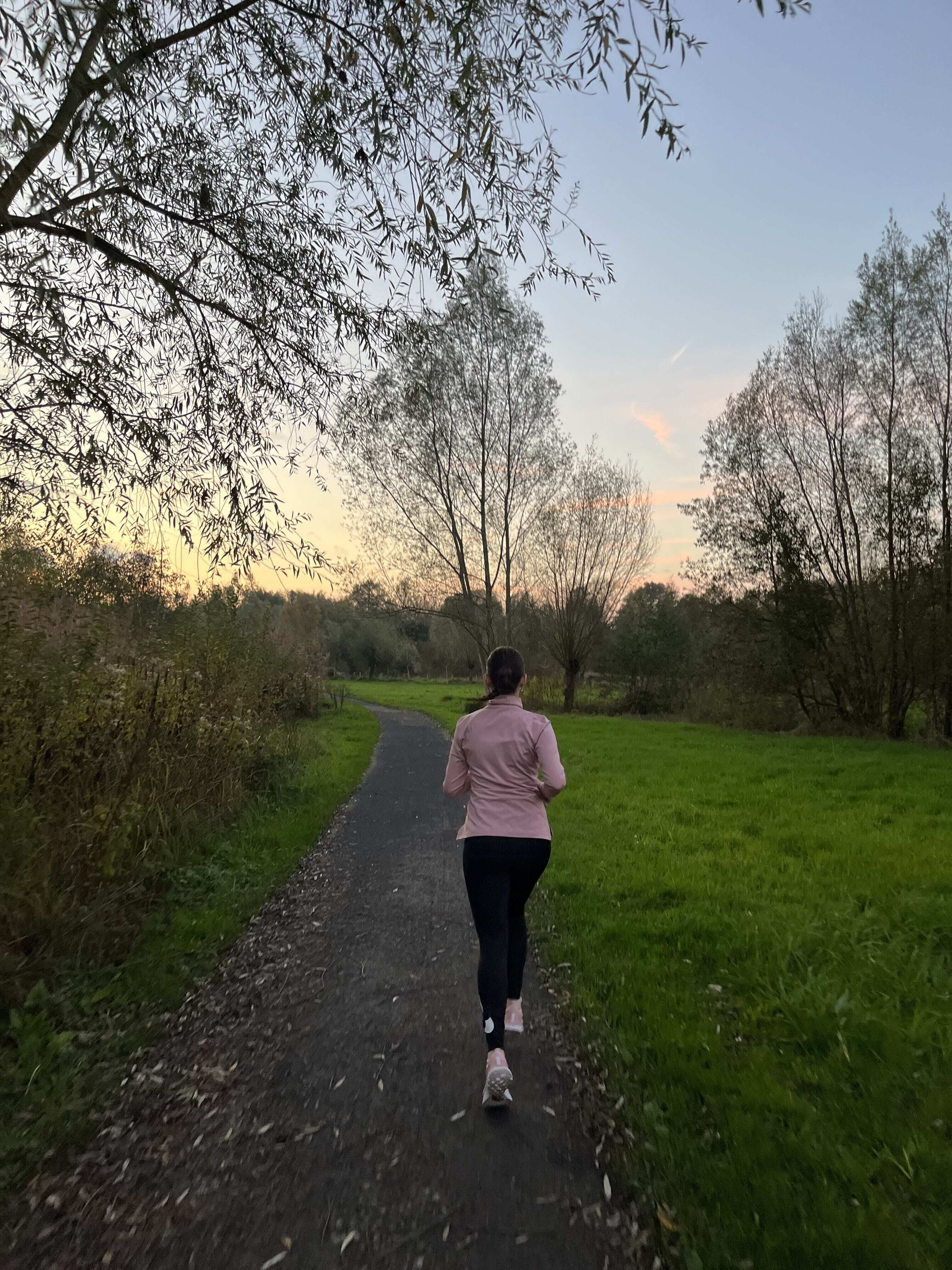 girl running in the forrest 