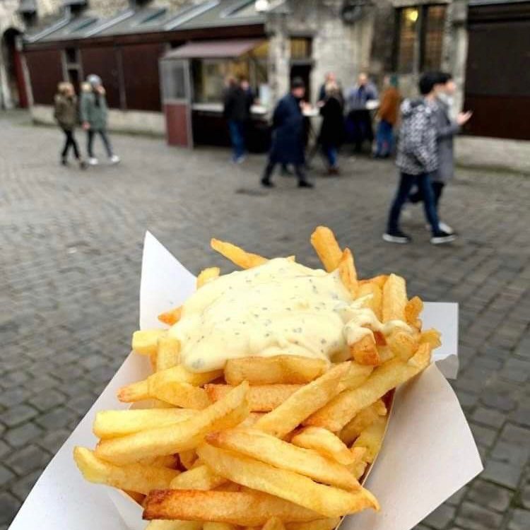 A portion of fries with mayonaise